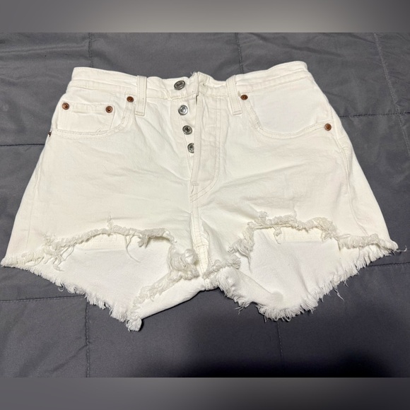 Levi's Pants - Levi white denim shorts. Fits a size 25.